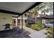 Condo building exterior showcasing entrance and walkway at 524 Pine Hollow Cir # 524, Englewood, FL 34223