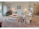 Relaxing living room includes comfortable seating, a coffee table, and access to a balcony at 524 Pine Hollow Cir # 524, Englewood, FL 34223