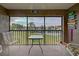 Relaxing screened balcony overlooking a tranquil lake and community at 524 Pine Hollow Cir # 524, Englewood, FL 34223