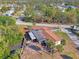 Single story home with canal-front lot, aerial view at 1460 Duncan Pl, Englewood, FL 34223