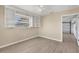 Spacious bedroom with access to garage and tile flooring at 1493 Janet Pl, Englewood, FL 34223