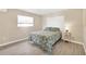 Charming bedroom with a queen-size bed and neutral decor at 1493 Janet Pl, Englewood, FL 34223