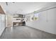 Large garage with workshop area and painted floor at 1493 Janet Pl, Englewood, FL 34223
