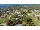 Aerial view of a single-Gathering home on a large lot, near the water at 1770 Hudson St, Englewood, FL 34223