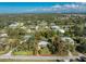 An aerial shot of a single-story home with a large yard at 1770 Hudson St, Englewood, FL 34223