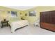 Cozy bedroom with a double bed, light walls, and ample closet space at 1770 Hudson St, Englewood, FL 34223