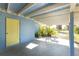 View from the other side of the carport, showing access to the backyard at 1770 Hudson St, Englewood, FL 34223