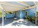 Covered carport area with additional storage at 1770 Hudson St, Englewood, FL 34223