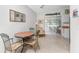 Cozy dining space adjacent to the kitchen and living room at 1770 Hudson St, Englewood, FL 34223