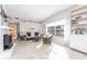 Sunlit living room showcasing a fireplace and ample seating at 1770 Hudson St, Englewood, FL 34223