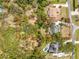 Large homesite offering privacy with lots of mature trees and landscaping at 1828 Whispering Pines Cir, Englewood, FL 34223