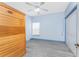 Bedroom featuring a wood sauna, ceiling fan, a neutral paint and wood-look flooring at 1828 Whispering Pines Cir, Englewood, FL 34223