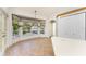 Cozy breakfast nook with large windows and lots of natural light at 1828 Whispering Pines Cir, Englewood, FL 34223