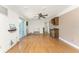 Bright living room with hardwood floors, bar area and lots of space at 1828 Whispering Pines Cir, Englewood, FL 34223