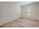 Bright bedroom with neutral walls and light wood flooring at 18302 Gypsy Ave, Port Charlotte, FL 33954