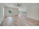Spacious living room with hardwood floors and an open floor plan at 18302 Gypsy Ave, Port Charlotte, FL 33954