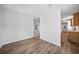Bright dining area with wood-look floors and an open view to the kitchen at 18399 Fremont Ave, Port Charlotte, FL 33954