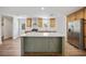 Modern kitchen with island and stainless steel appliances at 18399 Fremont Ave, Port Charlotte, FL 33954