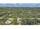 Aerial view of two houses and surrounding landscape at 19095 Willard Ave, Port Charlotte, FL 33954