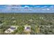 Aerial view of two houses and surrounding landscape at 19095 Willard Ave, Port Charlotte, FL 33954