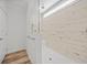 Walk-in shower with neutral tile and built-in bench at 19095 Willard Ave, Port Charlotte, FL 33954