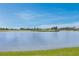 Serene lake view with lush green landscape at 23536 Awabuki Dr # 4B, Venice, FL 34293