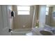 Bathroom with shower and tub combo at 328 Baytree Dr, Rotonda West, FL 33947