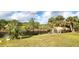 Relaxing canal-front lot with palm trees at 328 Baytree Dr, Rotonda West, FL 33947