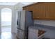 Kitchen featuring stainless steel refrigerator and white dishwasher at 328 Baytree Dr, Rotonda West, FL 33947
