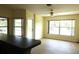 Open living room with natural light and view of backyard at 328 Baytree Dr, Rotonda West, FL 33947