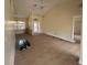 Open-concept living area featuring new floors, great natural light and seamless flow to the front entrance at 328 Baytree Dr, Rotonda West, FL 33947