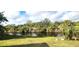 Peaceful waterfront property, grassy backyard at 328 Baytree Dr, Rotonda West, FL 33947
