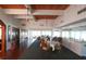 Elegant dining room with hardwood floors and scenic ocean views at 5000 Gasparilla Rd # 73A, Boca Grande, FL 33921