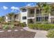Condo exterior with landscaped grounds and private balcony at 5000 Gasparilla Rd # 73A, Boca Grande, FL 33921