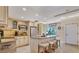 Well-equipped kitchen featuring stainless steel appliances and kitchen island with seating at 5000 Gasparilla Rd # 73A, Boca Grande, FL 33921