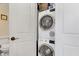 Convenient in-unit laundry featuring a stacked washer and dryer at 5000 Gasparilla Rd # 73A, Boca Grande, FL 33921
