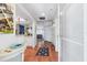 Bright entryway with tile floor and access to kitchen at 502 Pine Hollow Cir # 502, Englewood, FL 34223
