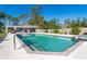 Inviting pool with a convenient step-in entrance at 5868 Denison Dr, Venice, FL 34293