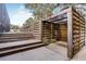 Private outdoor shower with wooden structure and fenced enclosure at 651 Dixon Rd, Venice, FL 34292