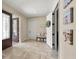 Welcoming foyer with a decorative tile floor, coat closet, and Gathering photos at 710 Albee W Rd, Nokomis, FL 34275