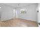Bright bedroom with light wood flooring and ceiling fan at 7147 Lago St, Sarasota, FL 34241
