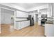 Bright kitchen with stainless steel appliances and granite countertops at 7147 Lago St, Sarasota, FL 34241