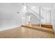 Bright living room featuring hardwood floors and a staircase at 7147 Lago St, Sarasota, FL 34241