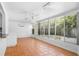 Sunroom featuring terracotta tile flooring and ample natural light at 7147 Lago St, Sarasota, FL 34241