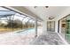 An outdoor patio includes a pool and a screened in lanai at 7330 Printer St, Port Charlotte, FL 33981