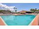 Resort-style pool area with spacious deck, perfect for relaxation and enjoyment at 735 Summersea Ct, Englewood, FL 34223
