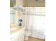 Clean bathroom with shower/tub combo, toilet, and vanity at 8100 Memory Ln # 207, Rotonda West, FL 33947
