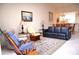 Spacious living room with comfortable seating, a dining area view, and large windows at 8100 Memory Ln # 207, Rotonda West, FL 33947
