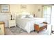 Relaxing main bedroom with a king-size bed and access to a private balcony at 8100 Memory Ln # 207, Rotonda West, FL 33947