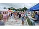 Busy Englewood Farmers Market with many vendors at 857 E 6Th St, Englewood, FL 34223